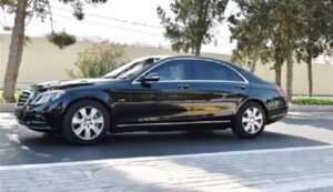aLIYEV DFRIVES A CAR