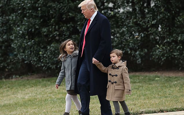 WASHINGTON, DC - FEBRUARY 17:  U.S. President Donald Trump walks with his grandchildren Arabella (L) and Joseph (R) Kushner, toward Marine One while departing from the White House on February 17, 2017 in Washington, DC. President Trump is traveling to South Carolina to visit the Boeing plant.  (Photo by Mark Wilson/Getty Images)